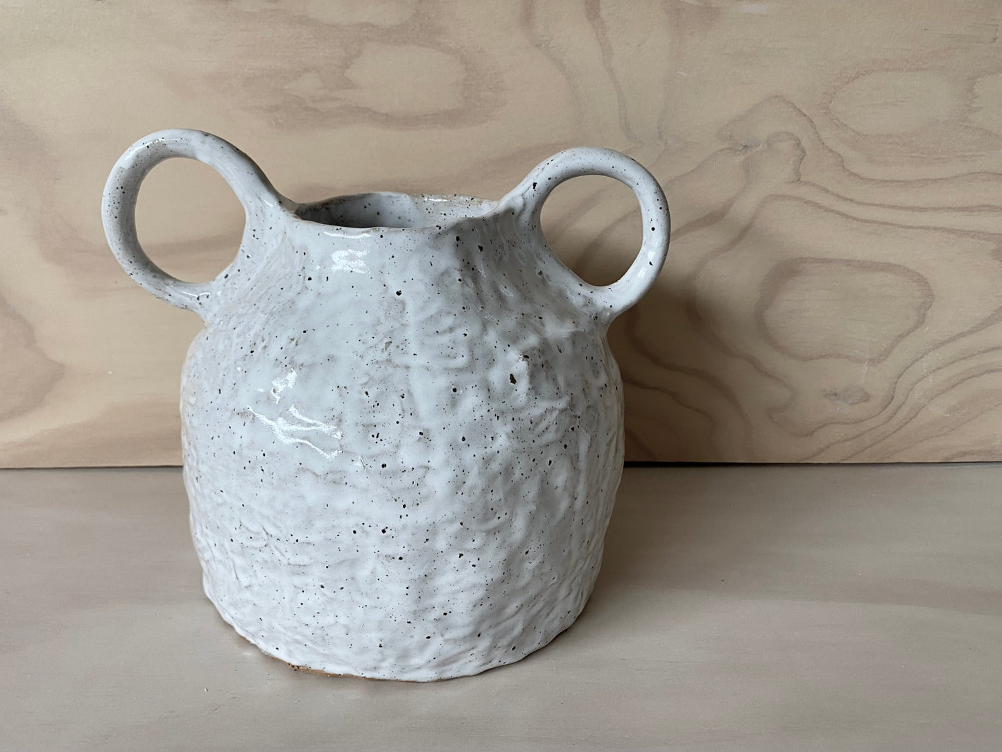 Speckled white vase